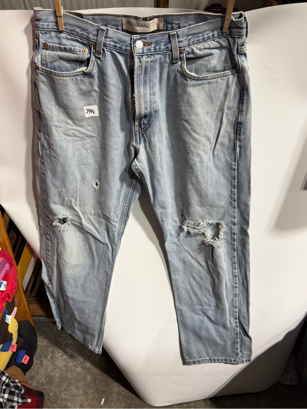#3994-Levi's Men's Light Blue Distressed Relaxed Jeans